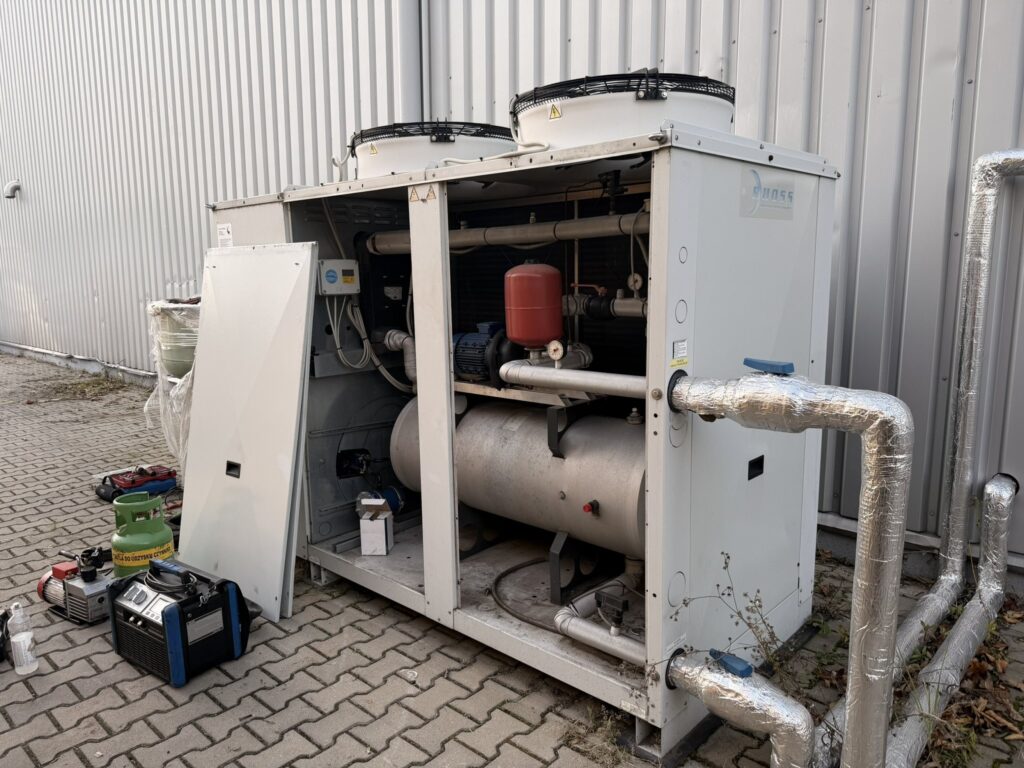 Chiller with service panels removed during diagnostics