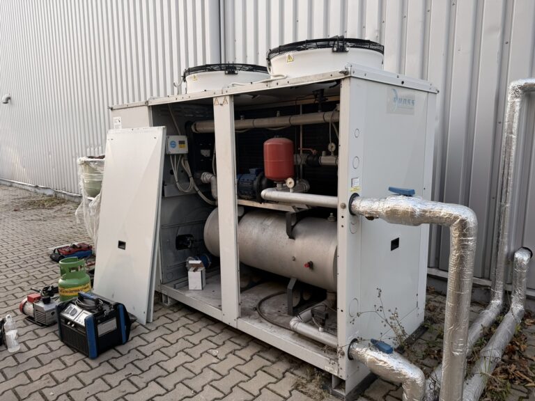 Chiller with service panels removed during diagnostics